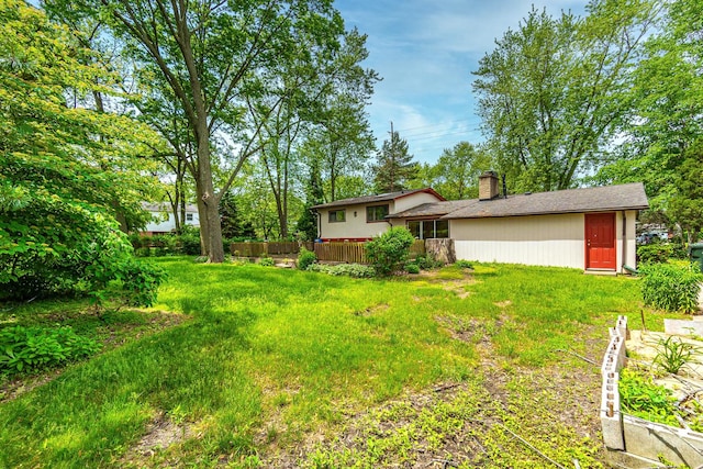 view of yard with a wooden deck