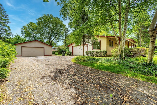 single story home featuring a garage