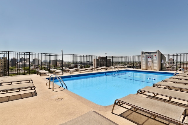 view of pool featuring a patio area