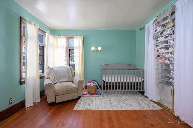 469 Dewey Ave, Galena, IL 61036 - bedroom with wood-type flooring and baseboards