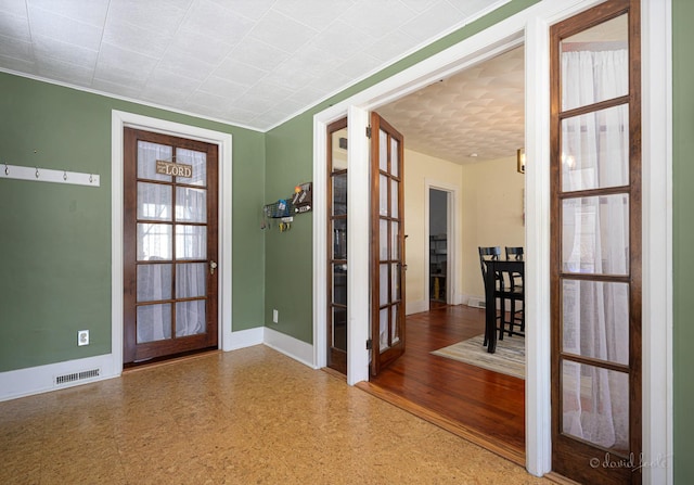 469 Dewey Ave, Galena, IL 61036 - doorway to outside with french doors, visible vents, and baseboards