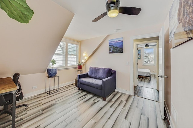 office area with wood finished floors and baseboards