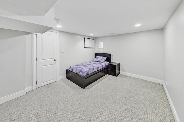 bedroom featuring baseboards, carpet flooring, and recessed lighting