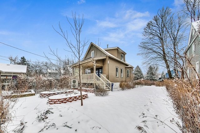 view of snow covered property