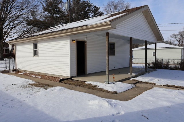 view of snow covered property