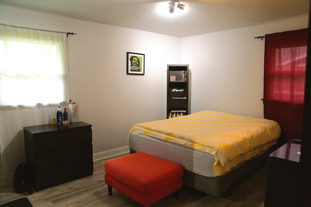 bedroom featuring hardwood / wood-style floors