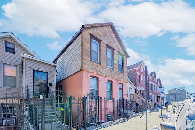 exterior space featuring a fenced front yard