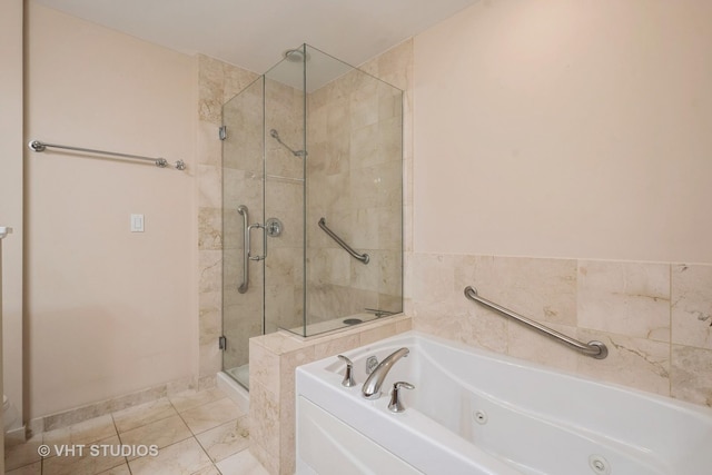 4953 Oakton St Unit 605, Skokie, IL 60077 - bathroom featuring a jetted tub and a shower stall