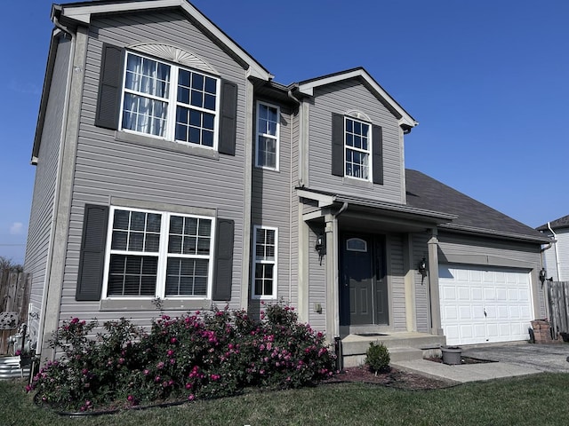 view of front of home with a garage