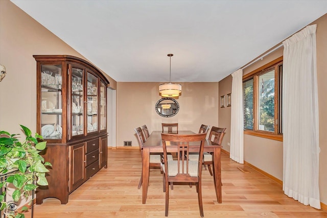 dining room with light hardwood / wood-style floors