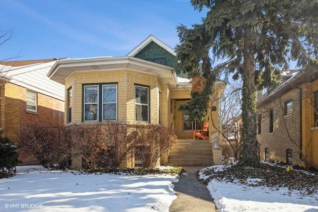 view of front of property with brick siding