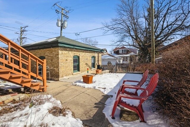 view of patio featuring fence