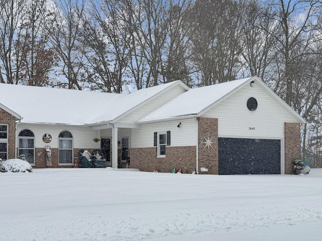 view of property exterior with brick siding and an attached garage