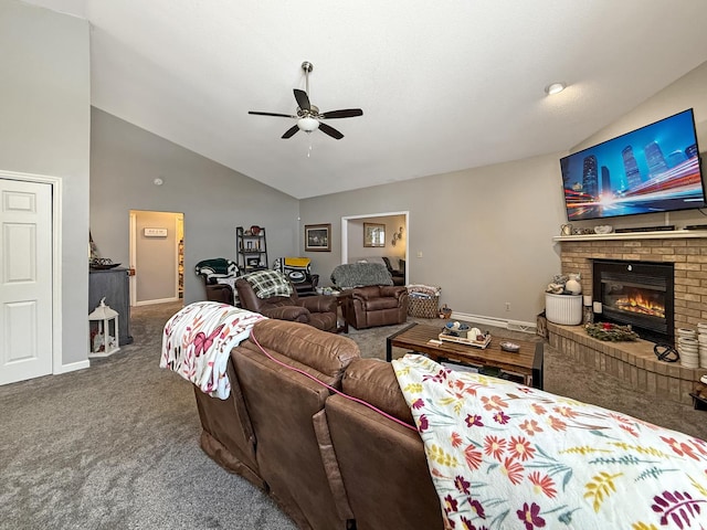 carpeted living room featuring vaulted ceiling, a brick fireplace, a ceiling fan, and baseboards