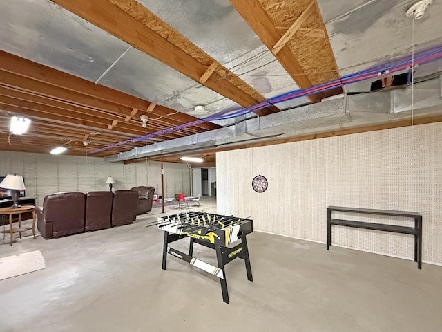 game room featuring concrete flooring