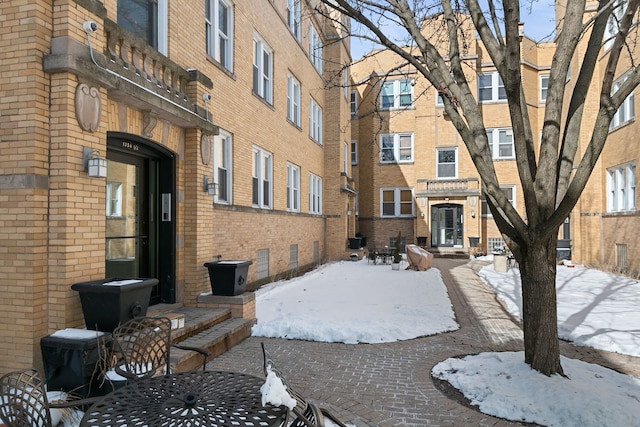 view of snow covered patio