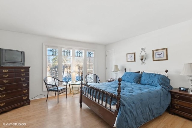 bedroom with light wood-type flooring