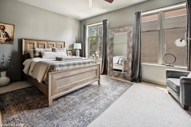 bedroom with carpet floors and ceiling fan