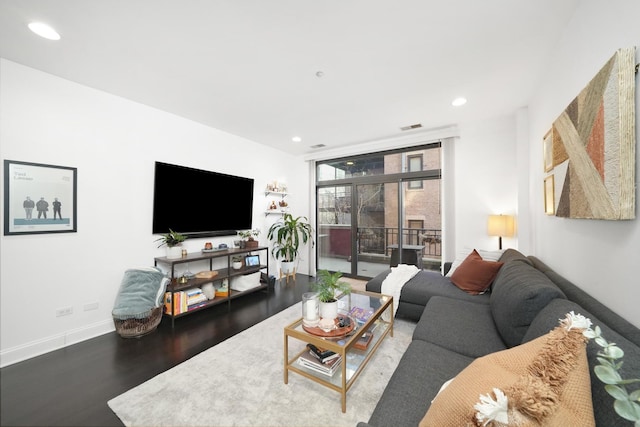 living room with hardwood / wood-style floors