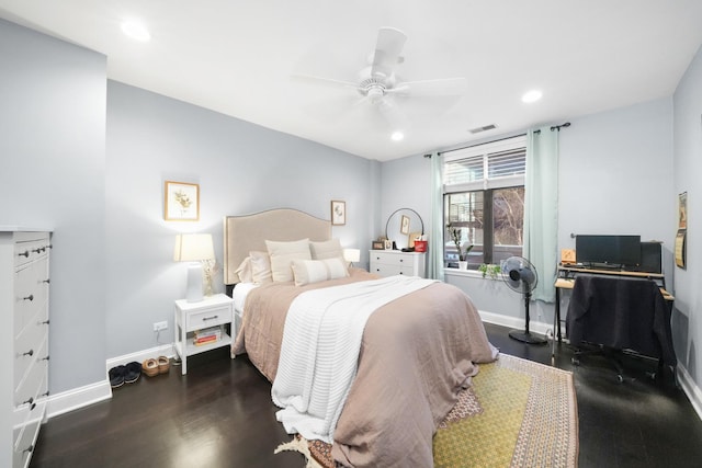 bedroom with dark wood-type flooring and ceiling fan