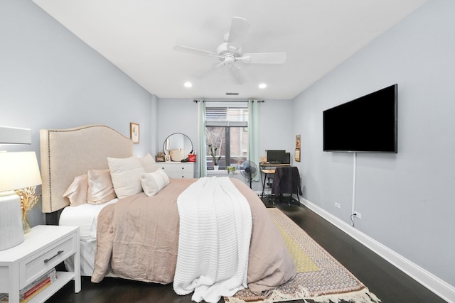 bedroom with dark wood-type flooring and ceiling fan