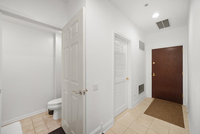 interior space featuring light tile patterned floors