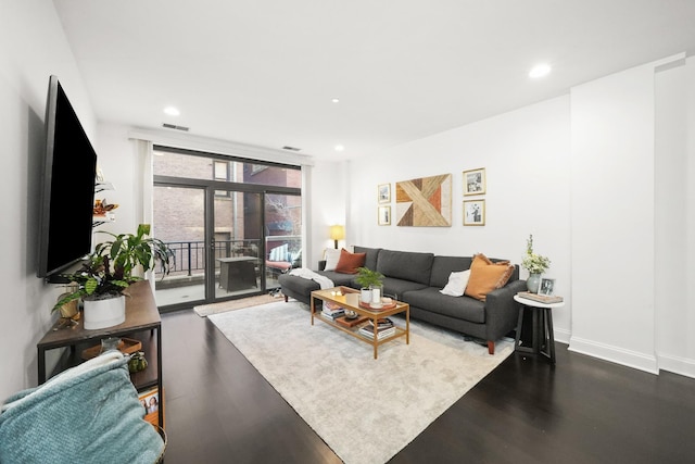 living room featuring dark hardwood / wood-style floors