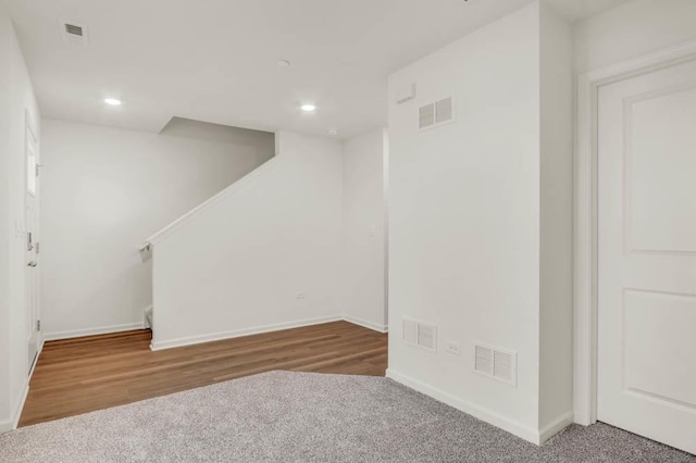 basement with wood-type flooring