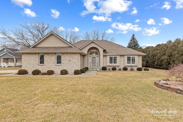 ranch-style house featuring a front yard