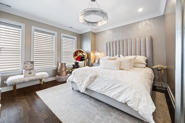 bedroom with crown molding and dark wood-type flooring