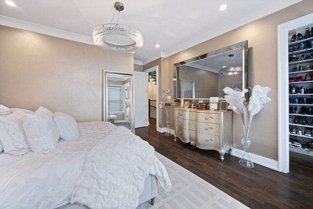 bedroom featuring ornamental molding and dark hardwood / wood-style floors