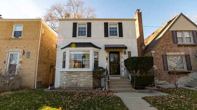 view of front property with a front yard