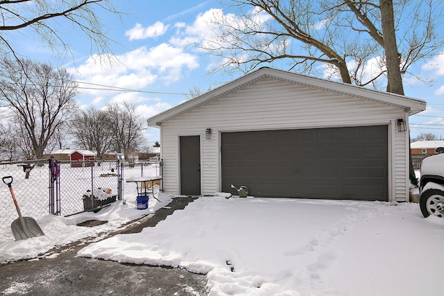 view of snow covered garage