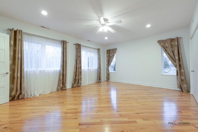 unfurnished room with light hardwood / wood-style floors and ceiling fan