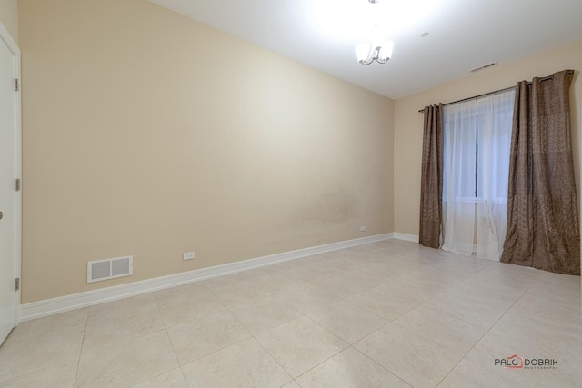 view of tiled spare room