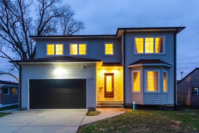 view of front of home with a garage