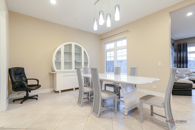 dining room with light tile patterned floors