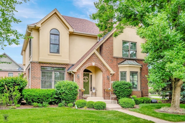 view of front of home with a front yard