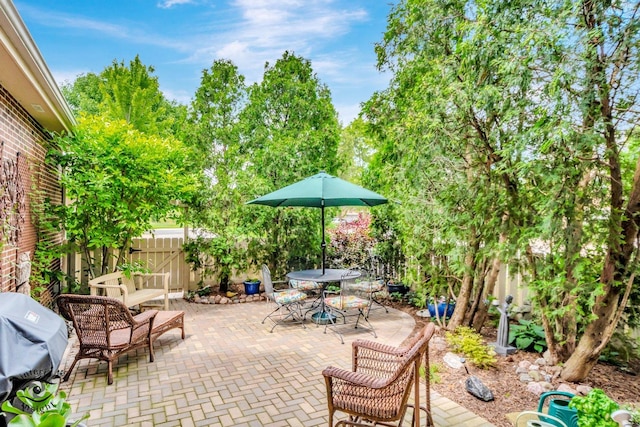 view of patio with a grill