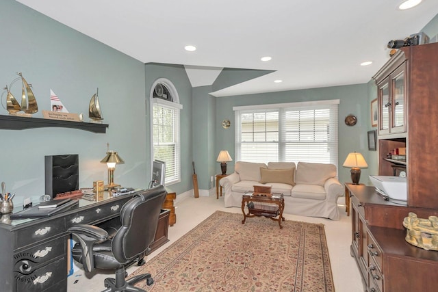 home office with light colored carpet