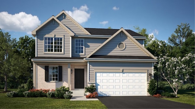 view of front of home with a garage and a front yard