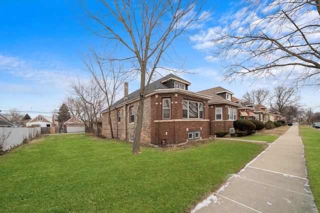 view of home's exterior featuring a lawn