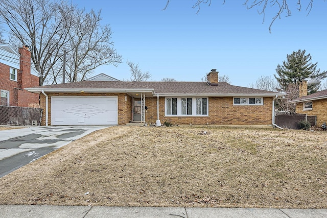 single story home featuring a garage