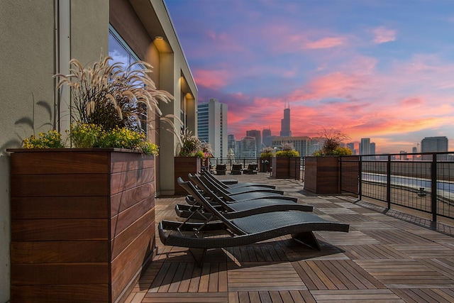 view of patio terrace at dusk