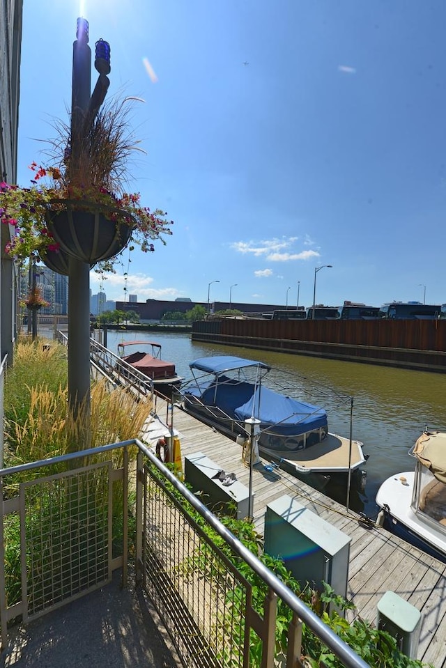 dock area featuring a water view