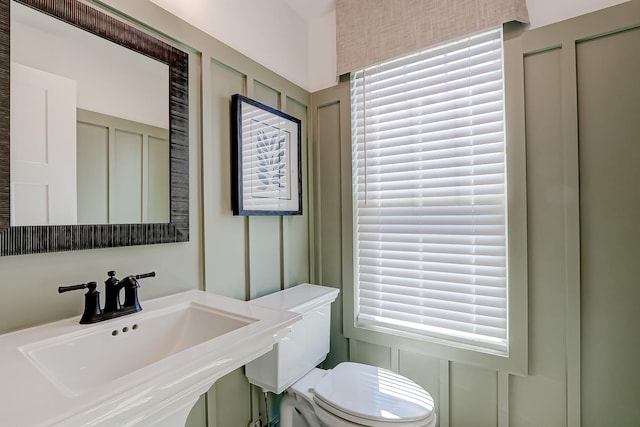 bathroom with sink and toilet