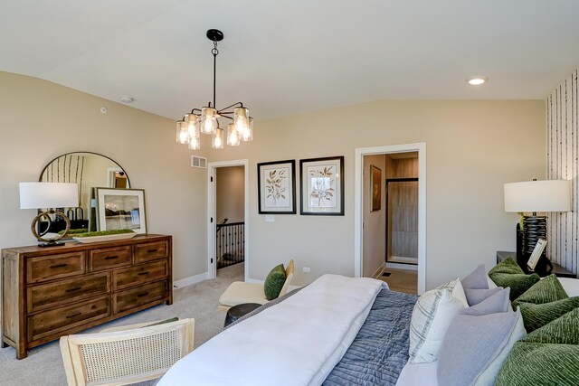 carpeted bedroom featuring vaulted ceiling and a chandelier