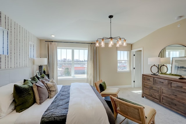 bedroom with vaulted ceiling, light carpet, and a notable chandelier