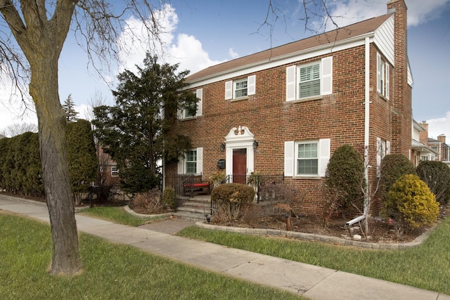 colonial house with a front lawn