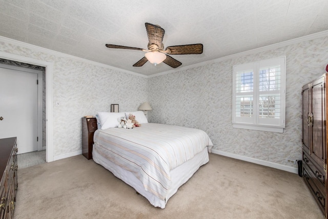 bedroom featuring crown molding, light colored carpet, and ceiling fan